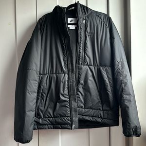 Nike black puffer jacket. Teddy inside